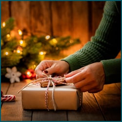 fall-holiday wrapping a gift
